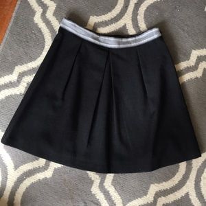 The limited grey pleated skirt